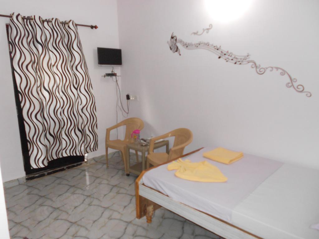 Casa Almeida Guest House Кандолим Номер фото