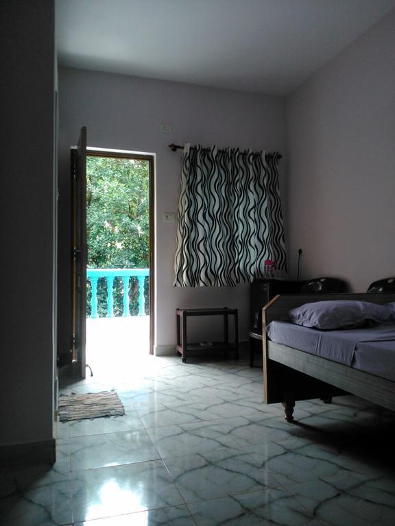 Casa Almeida Guest House Кандолим Номер фото